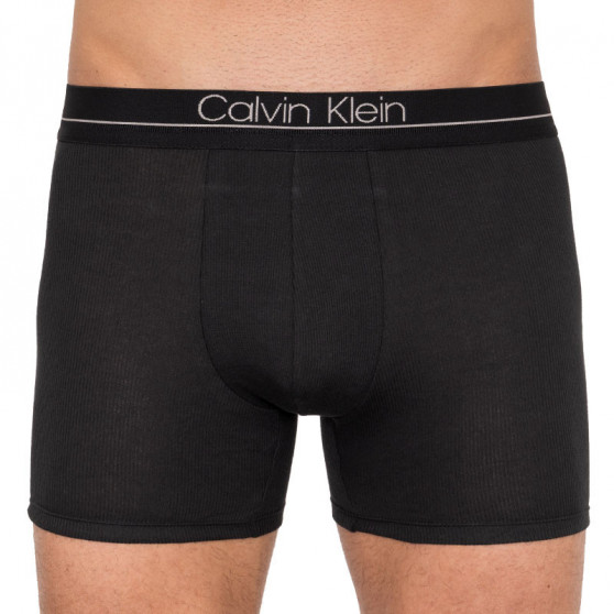3PACK fekete Calvin Klein férfi boxeralsó (NB2008A-001)