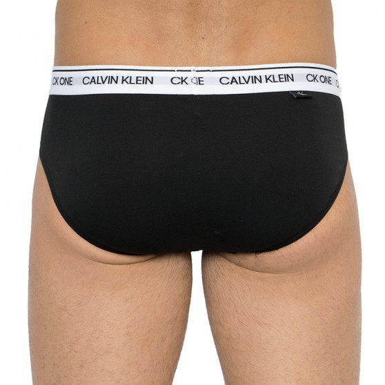 2PACK Fekete Calvin Klein férfi slip alsónadrág (NB2383A-BNM)