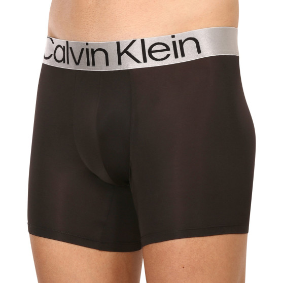 3PACK fekete Calvin Klein férfi boxeralsó (NB3075A-7V1)