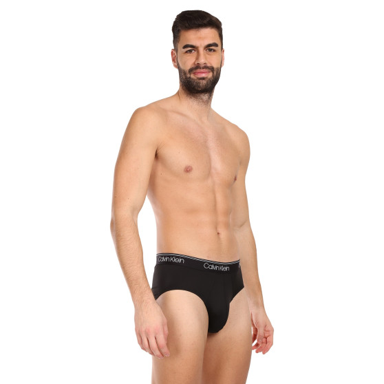 3PACK Fekete Calvin Klein férfi slip alsónadrág (NB2568A-GF0)