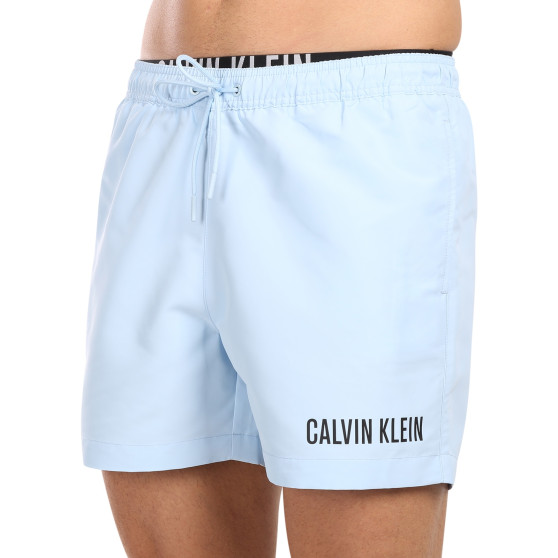 Férfi fürdőruha Calvin Klein kék (KM0KM00992-C7S)