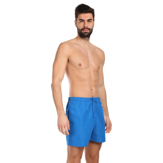 Férfi fürdőruha Calvin Klein kék (KM0KM01004-DYO)