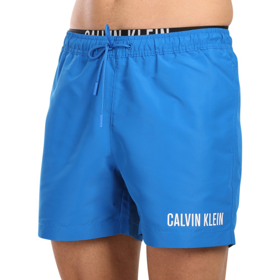 Férfi fürdőruha Calvin Klein kék (KM0KM00992-DYO)