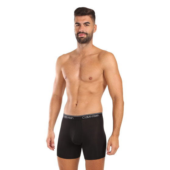 3PACK fekete Calvin Klein férfi boxeralsó (NB2570A-Q84)