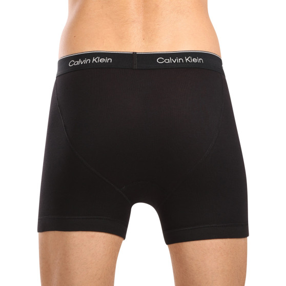 3PACK fekete Calvin Klein férfi boxeralsó (NB4003A-001)