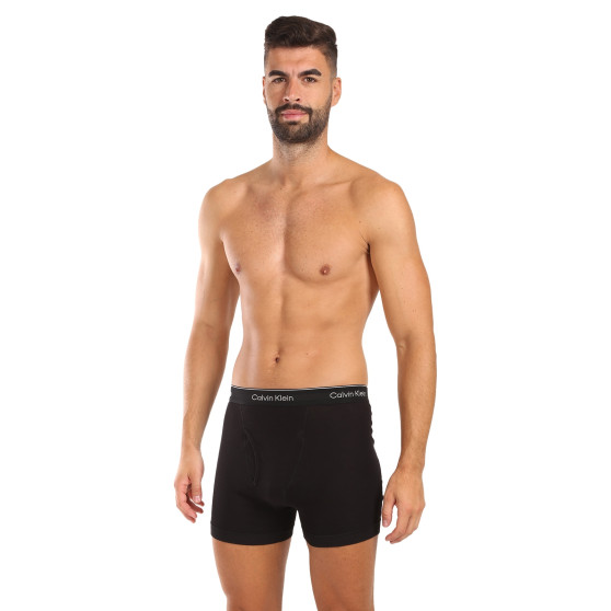 3PACK fekete Calvin Klein férfi boxeralsó (NB4003A-001)